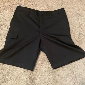 Black under armor dress shorts.